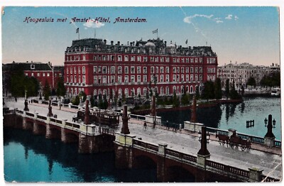 AMSTERDAM 1925: HOGESLUIS MET AMSTEL - HOTEL, STRAßENBAHN auf Brücke. Col. Karte