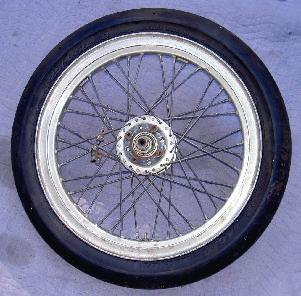 1960's? road race wheel with drop center Harley style alloy rim & Dunlop slick