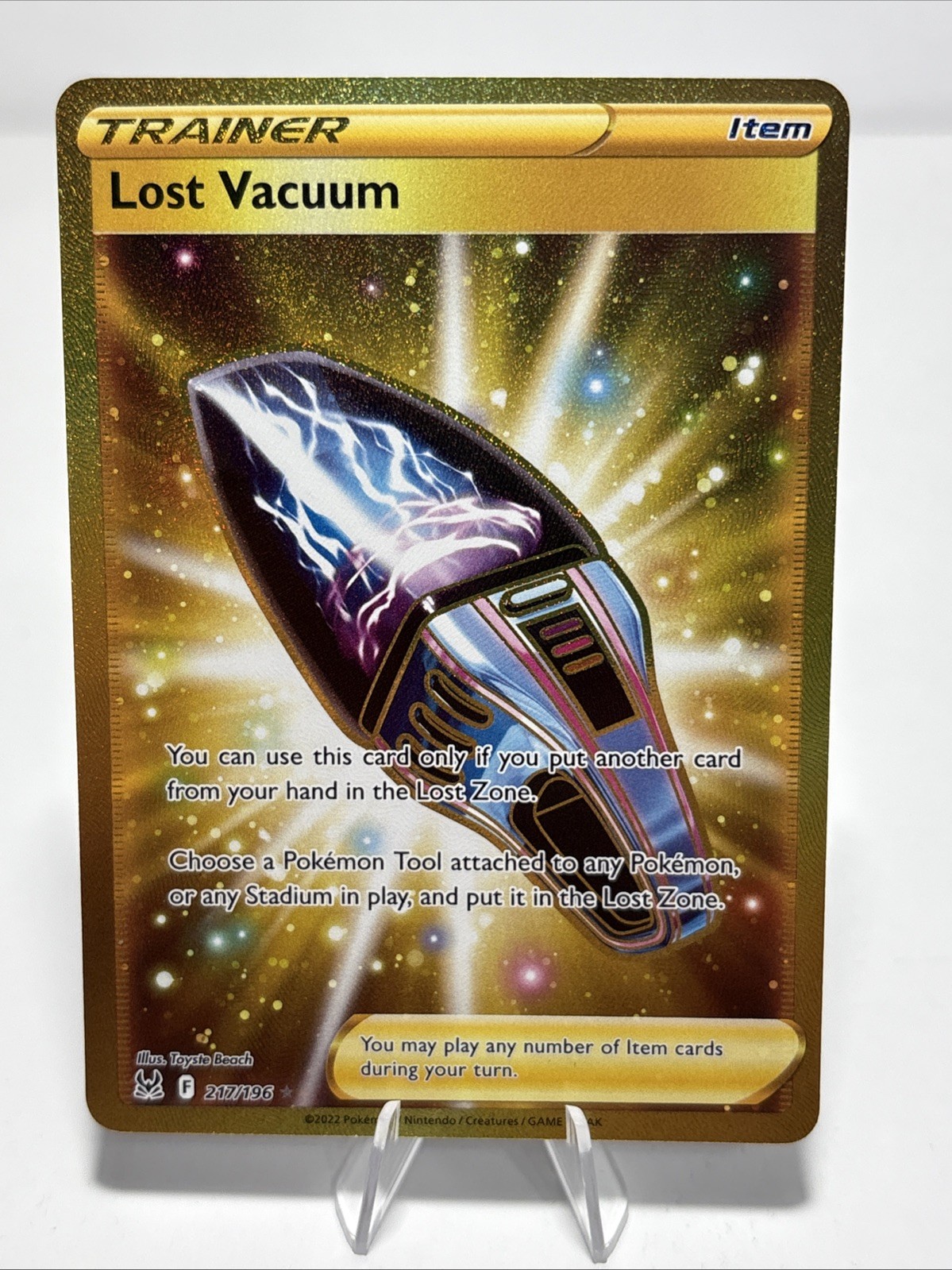 Lost Vacuum Trainer 217/196 Gold Secret Rare Pokémon TCG Lost Origin NM