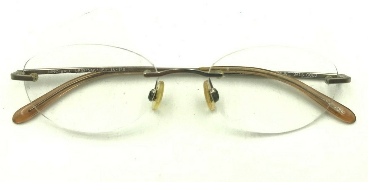 Vintage Nino Balli Gold Half Rim
Oval Eyeglasses with Sunglasses Clips Vintage Nino Balli Semi Rimless Eyeglass Frames, Japan 90s  main image 3