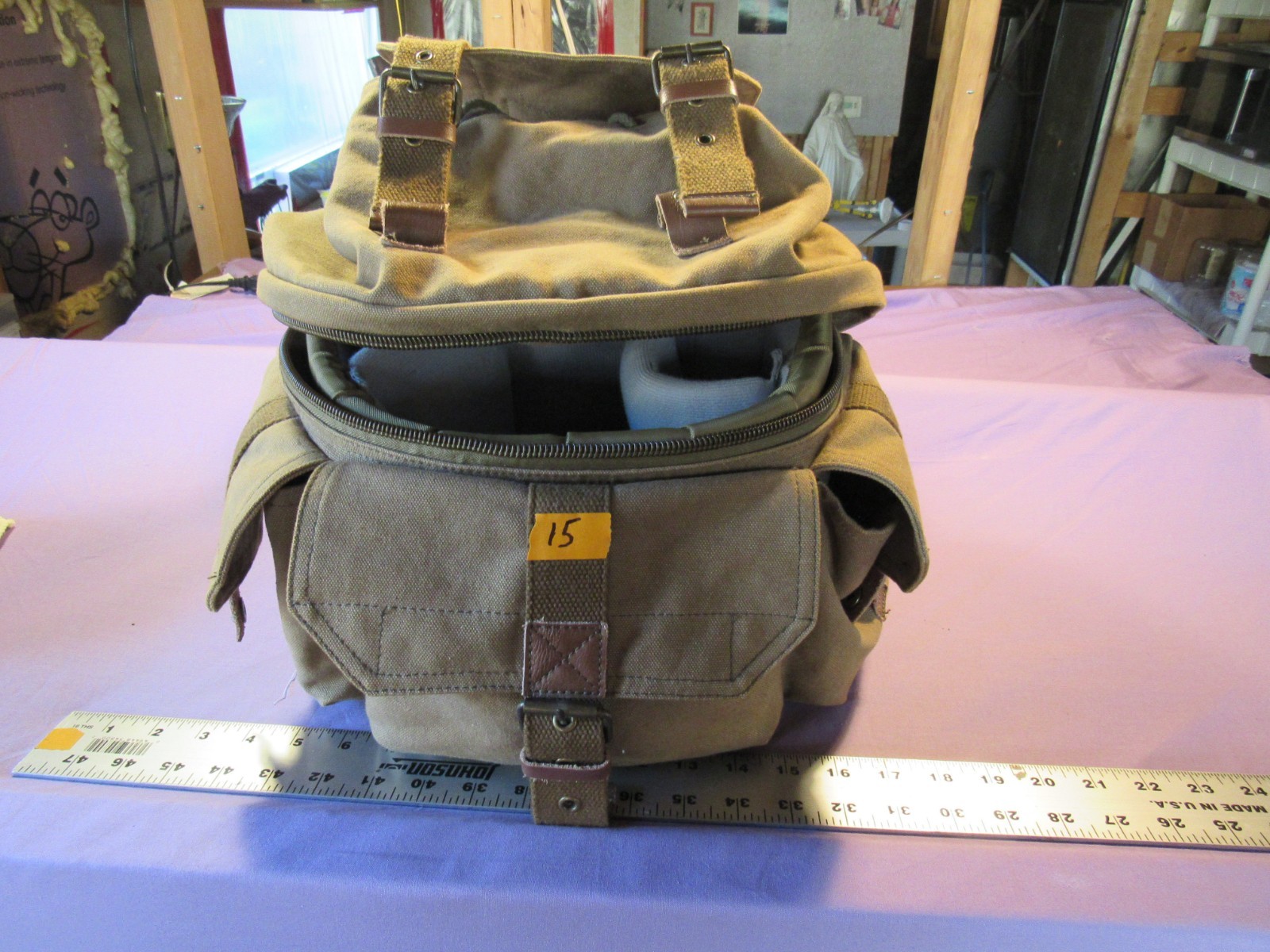 Cannon AE 1 camera with yucksack and misc. attachments