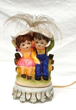 Underwriters Lab Aladdin Portable Ceramic Night Light Girl & Boy in the Rain