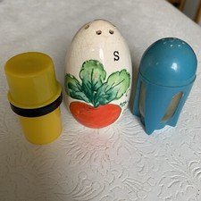 Lot If 3 Shakers- Yellow Plastic  Ceramic Shaker are Salt  Blue Shaker