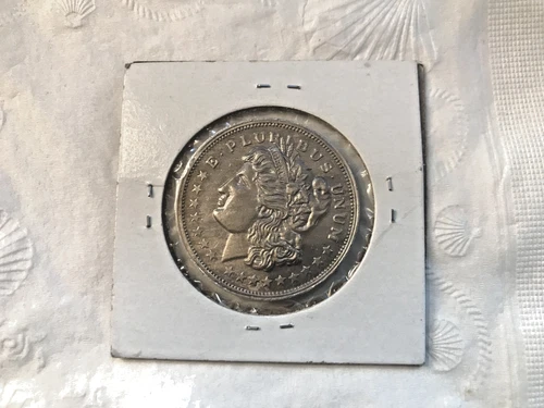 one silver trade unit finesilver .999+ morgan coin