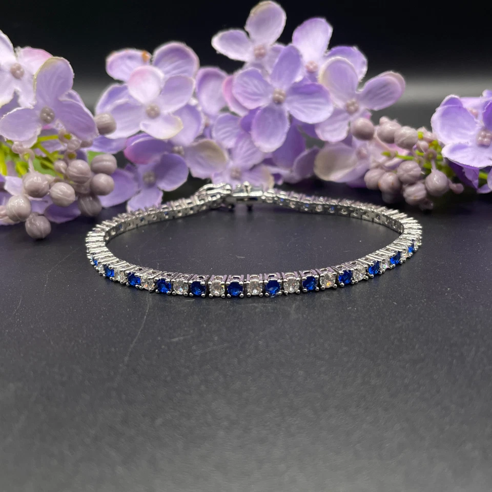 White Gold Finish Created Diamond Blue Sapphire Round Cut Tennis Bracelet - Image 2 of 4