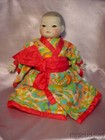 VINTAGE ORIENTAL STYLE CHINA HEAD & CLOTH BABY DOLL — photo 4