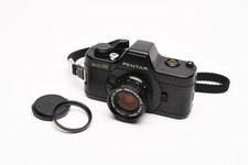 Pentax Auto 110 w/18mm f2.8, L39 UV and wrist strap, Tested