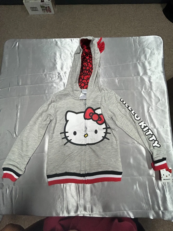 Sudadera con Capucha con Cremallera para Niñas Hello Kitty - Gris con Capucha con Lazo, Talla 6X Foto 2 de 3
