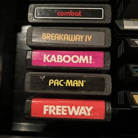 Atari 2600 Console With 16 Games, 4 Joysticks And 2 Paddles + Game Center