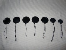 Lot of 7 Lens cap caps for camcorder or camera - Unbranded 7 