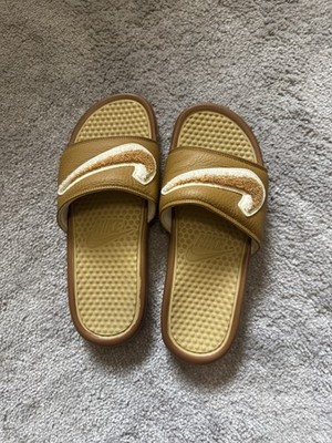 Nike Benassi JDI Chenille slides in a muted bronze and club gold colorway