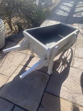 Large Wooden Decorative Garden Wheelbarrow Planter.   Good Condition.