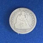 Two 1876 Seated Liberty Quarters from the USA Centennial. An 1876 and a 1876-S.