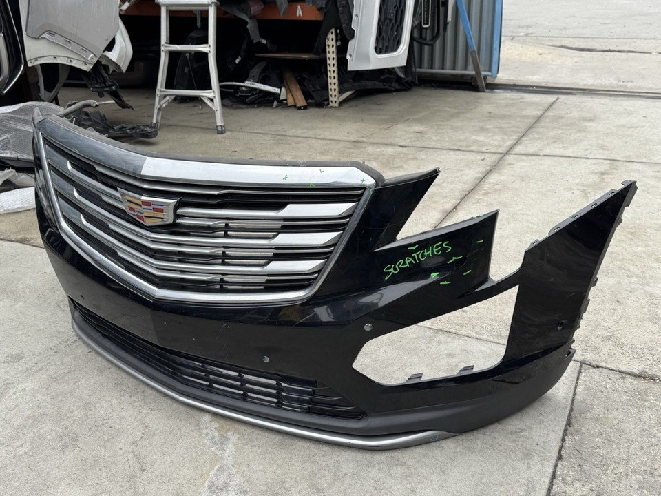2017-2024 CADILLAC XT5 FRONT BUMPER W/HOLE SENSORS W/GRILLE OEM 
