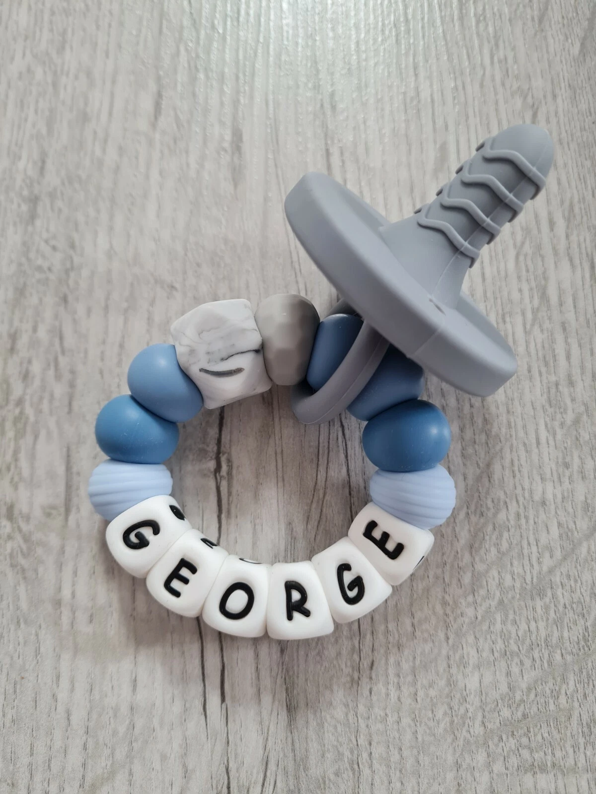 Silicone Personalised Dummy Teether Ring Bracelet Chewing Baby Boy Teething Blue
Opens in a new wind
