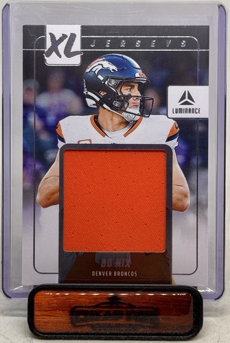 BO NIX RC GU 2024 PANINI LUMINANCE XL JERSEYS MATERIALS ROOKIE XLJ-BNI BRONCOS - Picture 1 of 3