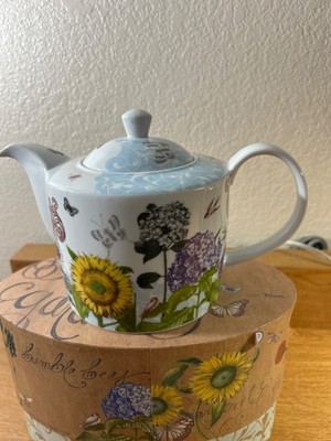 Rosanna ''The Poppy Field'' teapot featuring floral and insect