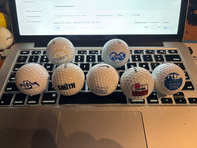 7 Logo Golf Bals Lot.  Used  great Condition.
