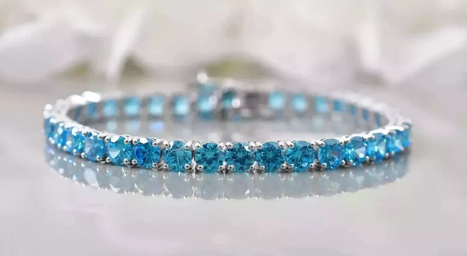 Brazalete tenis mujer 8 quilates corte redondo topacio azul simulado chapado en oro blanco 14 k Foto 2 de 3