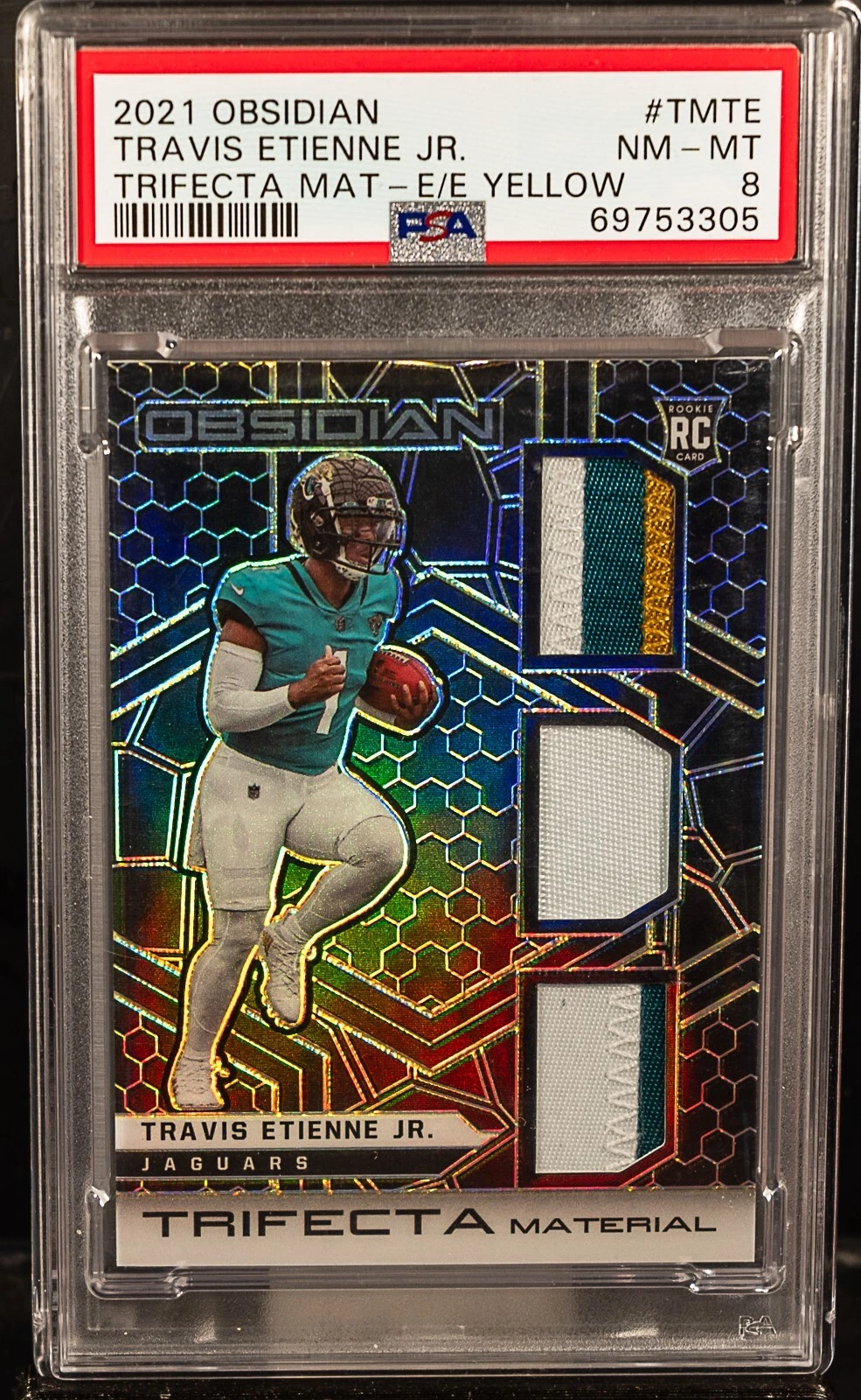 Travis Etienne Panini Obsidian Trifecta Material #TMTE Electric Etch Yellow