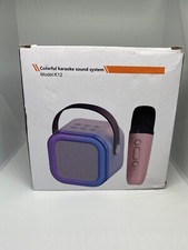 the singing machine mini sparkle karaoke machine . blue tooth wireless