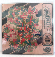 Puzzlebomb Bumfuzzled 1  ENIGMATIC GEWGAW  100 Piece Puzzle By Chad Krizan