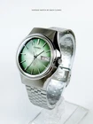 Seiko QR 3863-7010 Sunburst Green Dial
