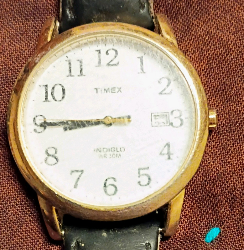 Timex Indiglo WR 30M  Quartz Analog Date Gold Case Black Leather Strap