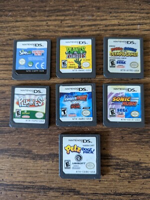 Nintendo DS games lot bundle of 7 games Sims 2,Smack Down Raw, Mario & Sonic