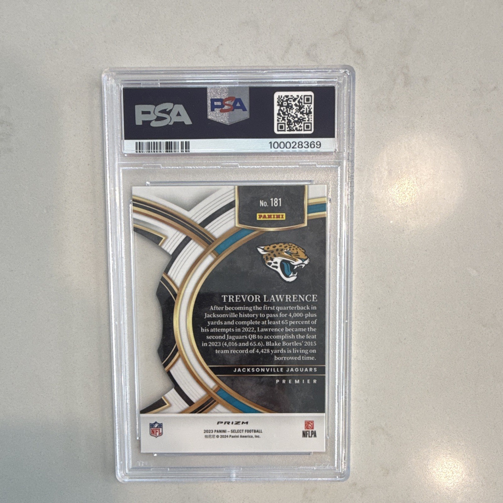 Panini Select 2023 Trevor Lawrence #181 Die-Cut Zebra Prizm Premier PSA 10 view 2