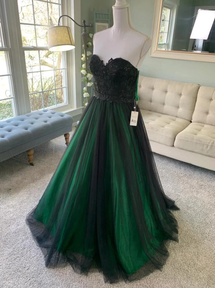 Green and black store ball gown