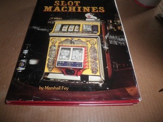 Slot Machines by Marshall Fey (Signed.) with Mills Novelty Co. Service Manual