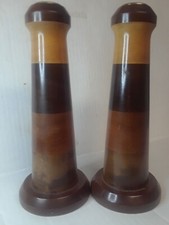 Coppia di candelabri vintage in legno segmentato metà secolo