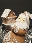 Gorgeous Gingerbread Santa Holding a Gingerbread House Christmas Tree Ornament