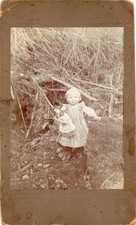 Cabinet Card Photo of Young Girl with Baby Doll