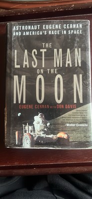 Signed book by Eugene Cernan titled  The Last Man On The Moon  w/dual COAs
