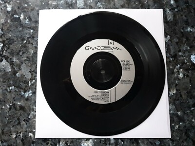 Holly Johnson - Atomic City / Beat The System  (MCA - MCA 1342)
