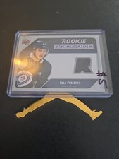 2021-22 Upper Deck Series 2 Hockey Rookie Threads Cole Perfetti Work Material