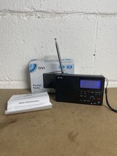 ONN AM FM Pocket Digital Radio Battery Powered Alarm LCD Clock Portable Travel