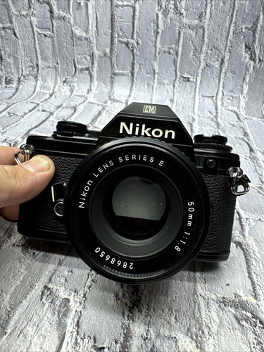 Working Nikon EM 35mm SLR Film Camera w/ Series E 50mm f/1.8 Lens - Picture 2 of 4