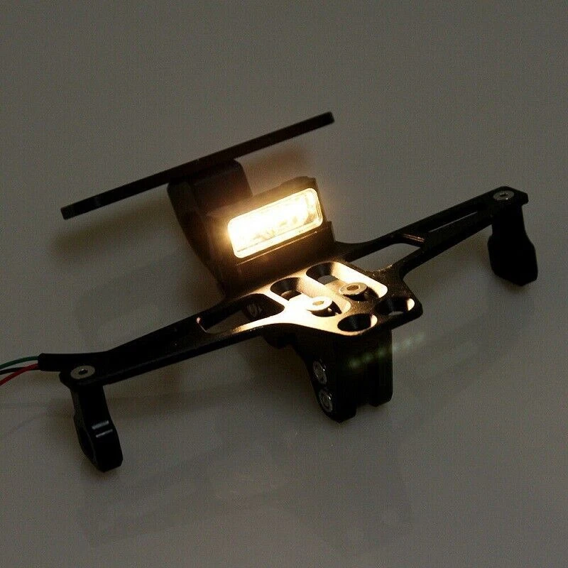 Soporte universal para placa de matrícula ordenado cola de motocicleta eliminador de guardabarros luz LED Foto 3 de 4