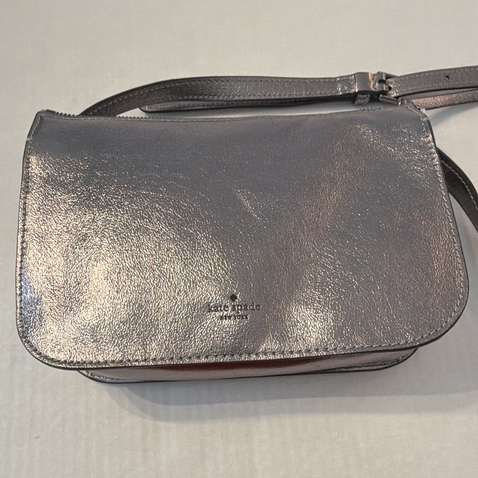 kate spade new york Metallic Silver Small Crossbody Zip Adjustable Strap Logo