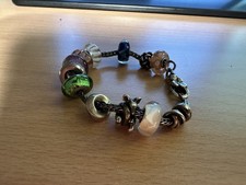 Trollbeads Armband mit Blumenverschluss und 13 Beads Glas & Metall