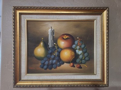 vintage framed/canvas oil painting , of fruit & candle. signed  Frank Lean