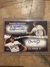Topps 2024 Baseball Orioles Dual Autograph Cal Ripken Brooks Robinson 9/10