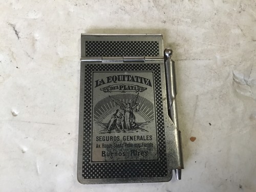Vintage printed tin advertising 1930 note pad and pencil with calendar