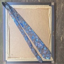 Italian all silk hand made tie floral pattern on a brown background