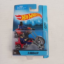 Hot Wheels Includes Figure 3-Squealer Blue and Red