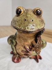 Vtg. frog figurine with dried flowers, maybe ceramic.