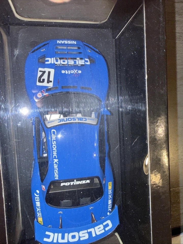 Coche diecast AUTOart 2002 Nissan Skyline R34 GTR #12 Calsonic JGTC 1:18 Foto 2 de 4